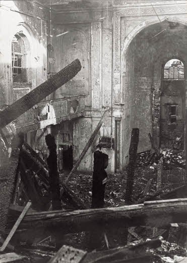 The synagogue of Aachen is set on fire and destroyed during the 'Kristallnacht' of 1938. Otto and Edith Frank were married there in 1925.